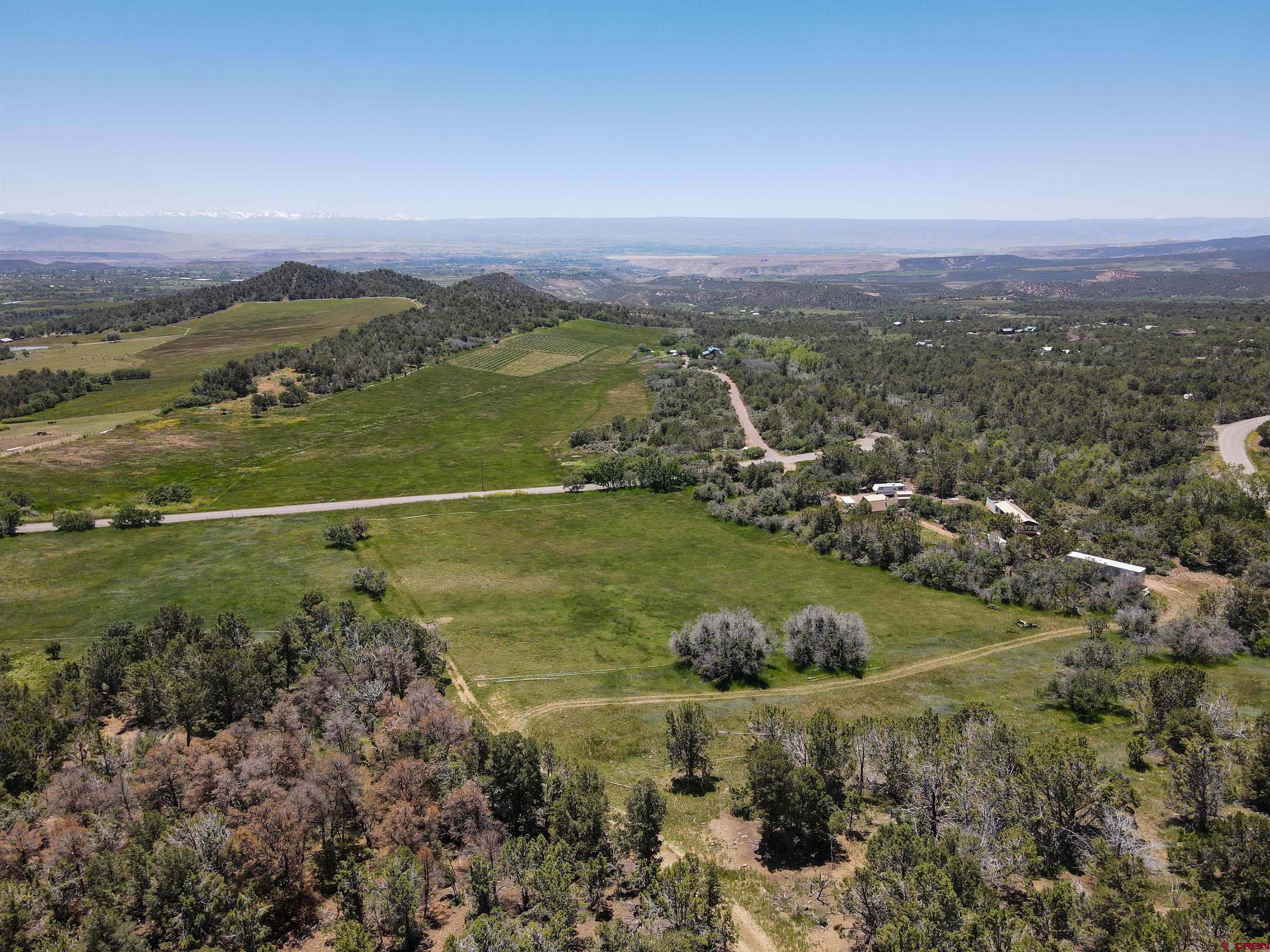 22043 Uintah Road Cedaredge, CO 81413 - Photo 13 of 19 a view of a city with an ocean
