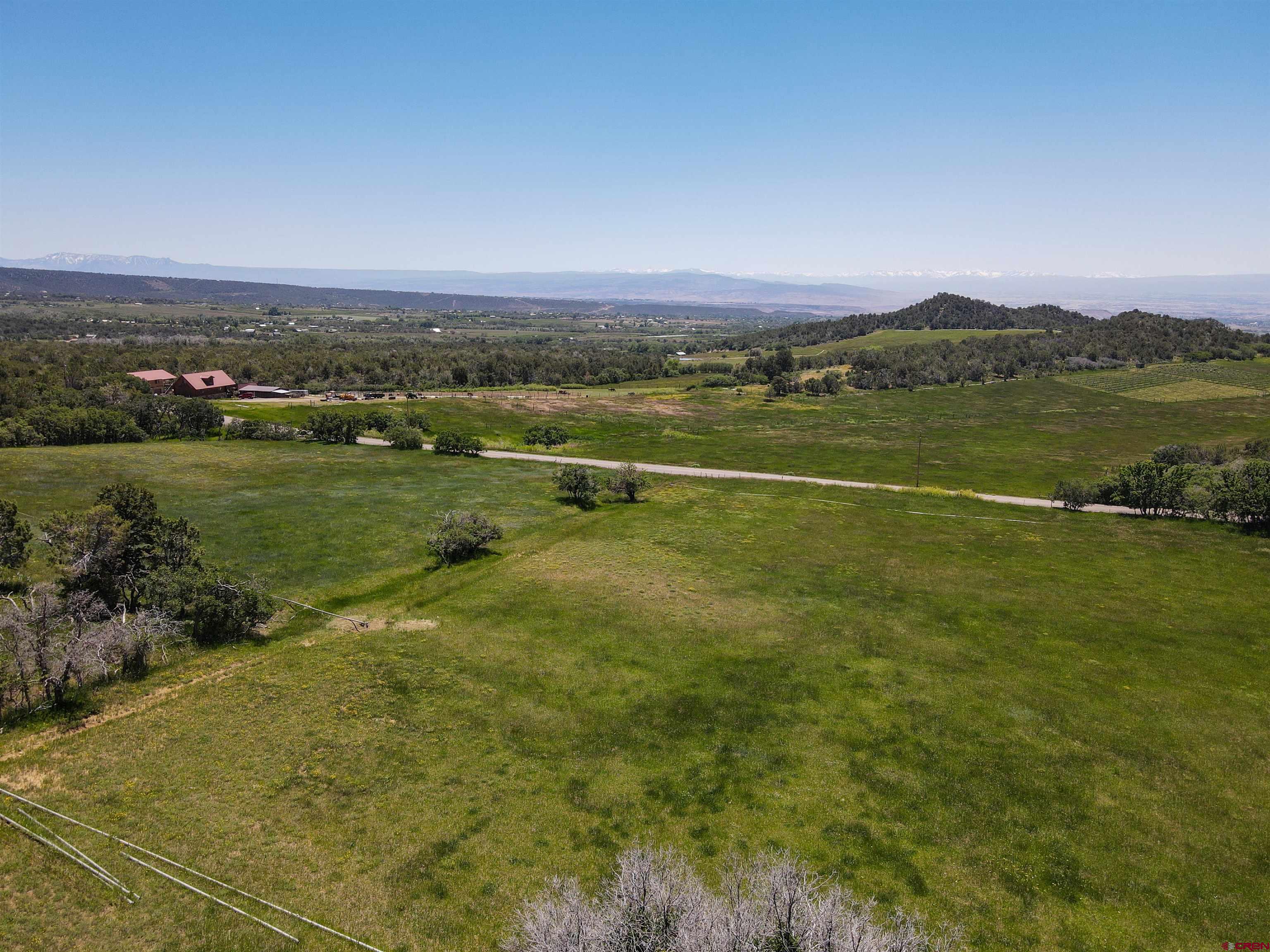 22043 Uintah Road Cedaredge, CO 81413 - Photo 3 of 19 a view of lake with city view