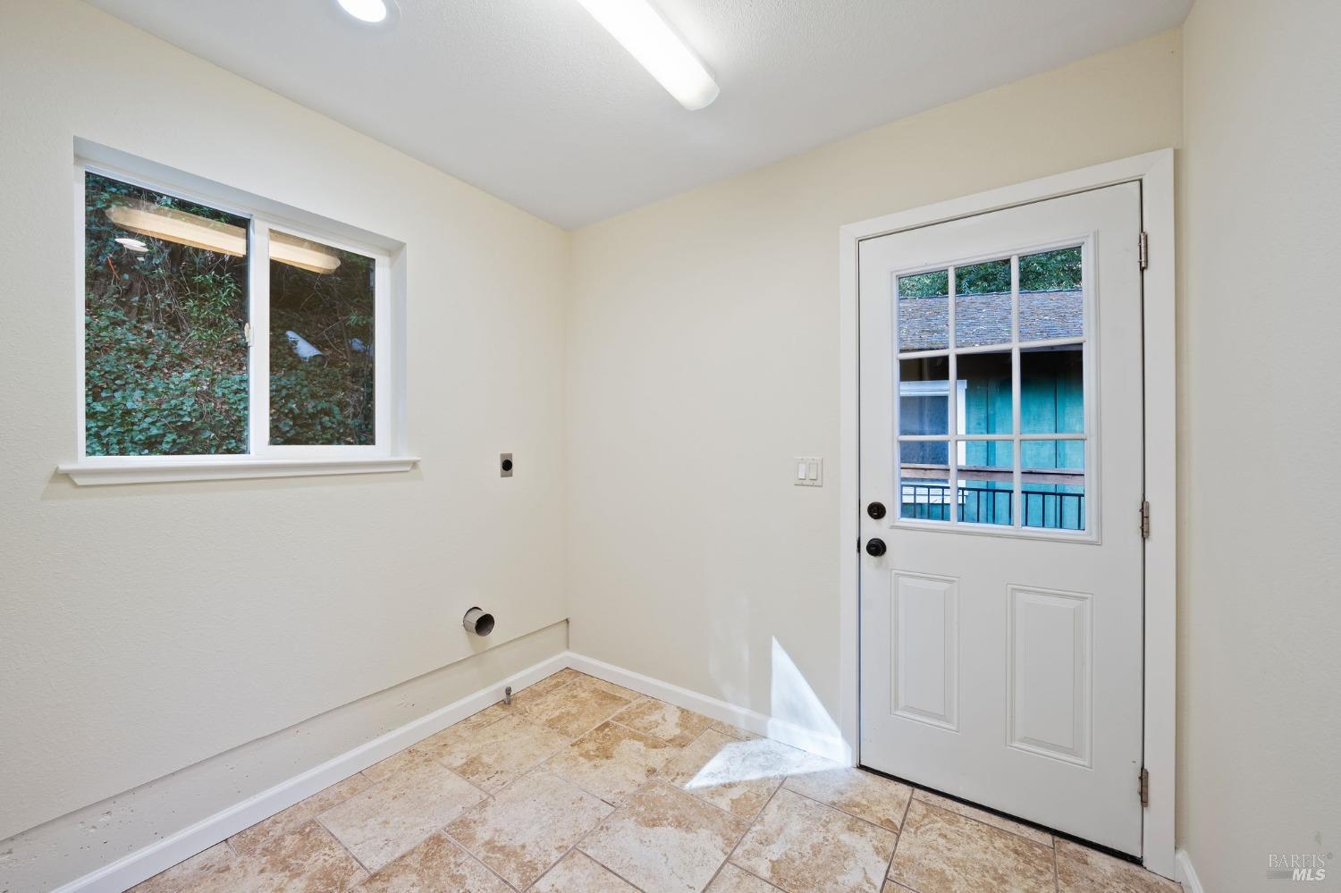 84 Front Street Camp Meeker, CA 95419 - Photo 15 of 24 a view of an empty room with a window