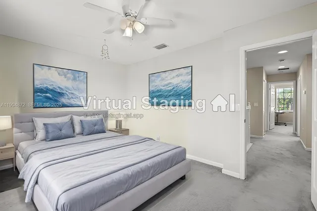 a bathroom with a sink double vanity mirror and a bathtub