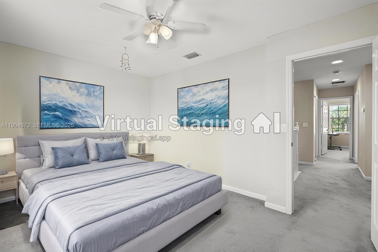 9042 Dupont Place Wellington, FL 33414 - Photo 19 of 43 a bedroom with a large bed and a chandelier