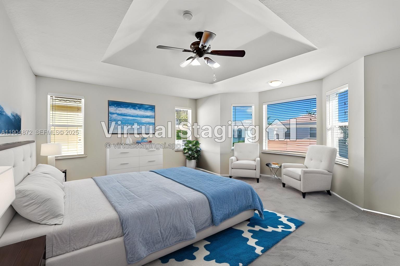 9042 Dupont Place Wellington, FL 33414 - Photo 21 of 43 a bedroom with a bed mirror and window