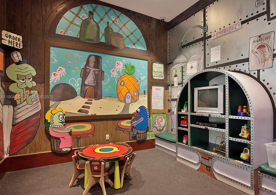 9042 Dupont Place Wellington, FL 33414 - Photo 30 of 43 a room with musical instruments