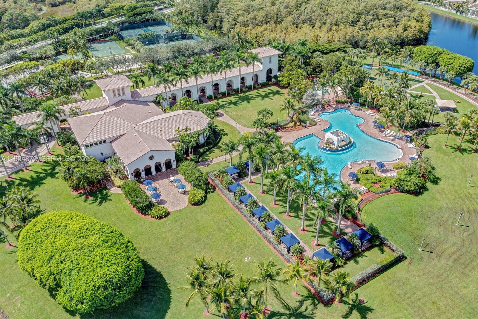 9042 Dupont Place Wellington, FL 33414 - Photo 33 of 43 an aerial view of a residential houses with yard and green space