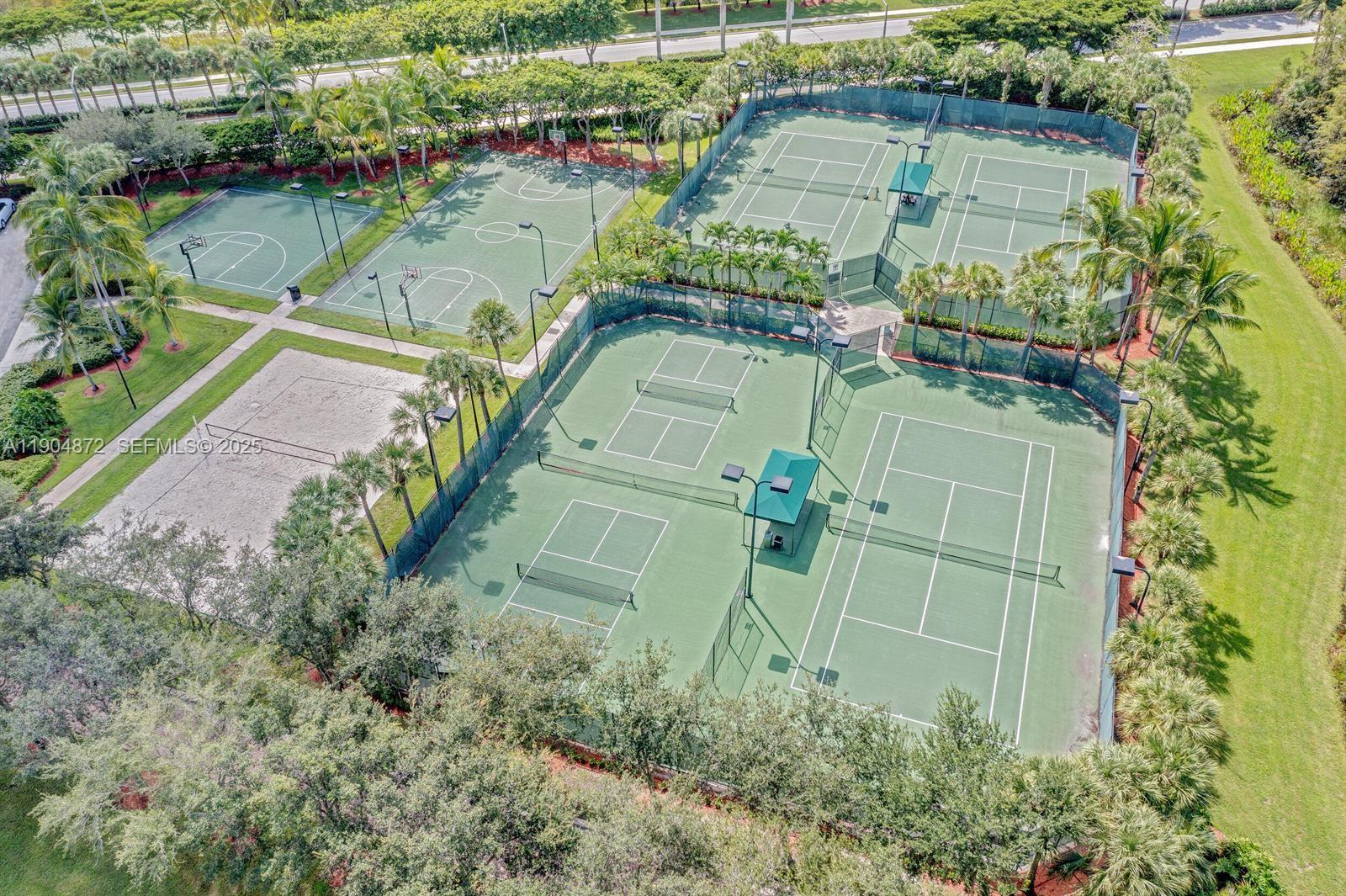 9042 Dupont Place Wellington, FL 33414 - Photo 36 of 43 an aerial view of a houses with outdoor space and lake view