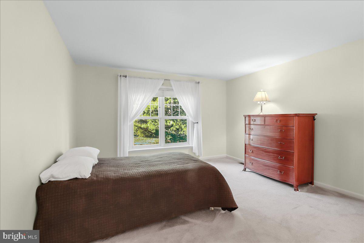 9 Parkside Drive Elverson, PA 19520 - Photo 11 of 33 a bedroom with a bed and a window