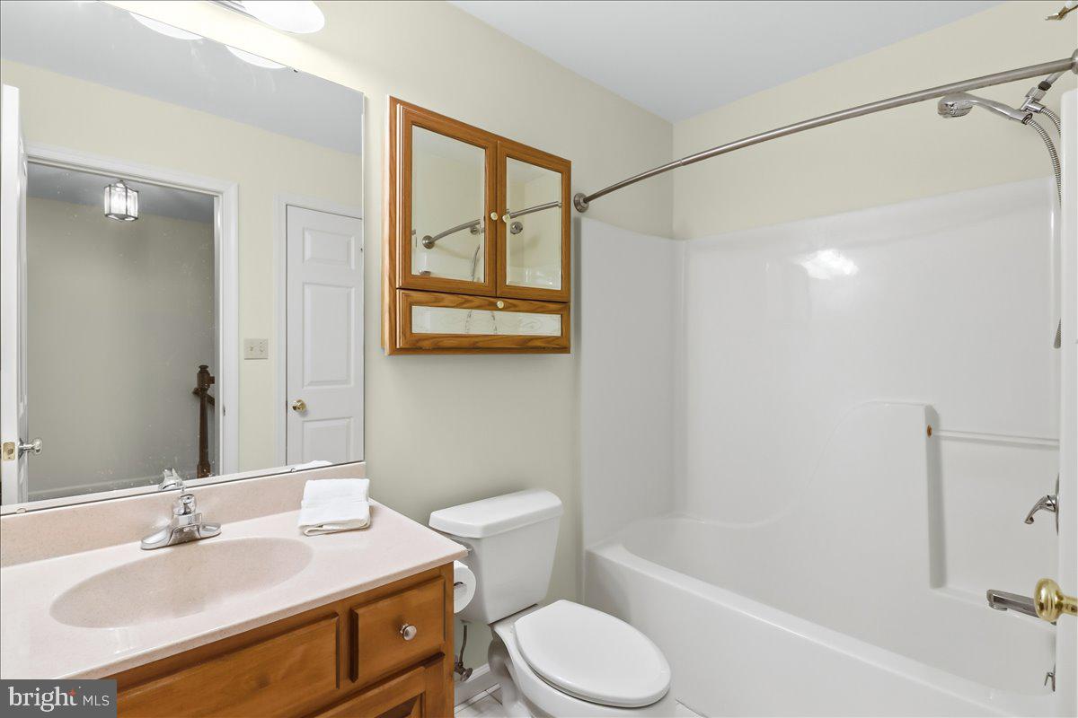 9 Parkside Drive Elverson, PA 19520 - Photo 22 of 33 a bathroom with a sink a toilet and shower