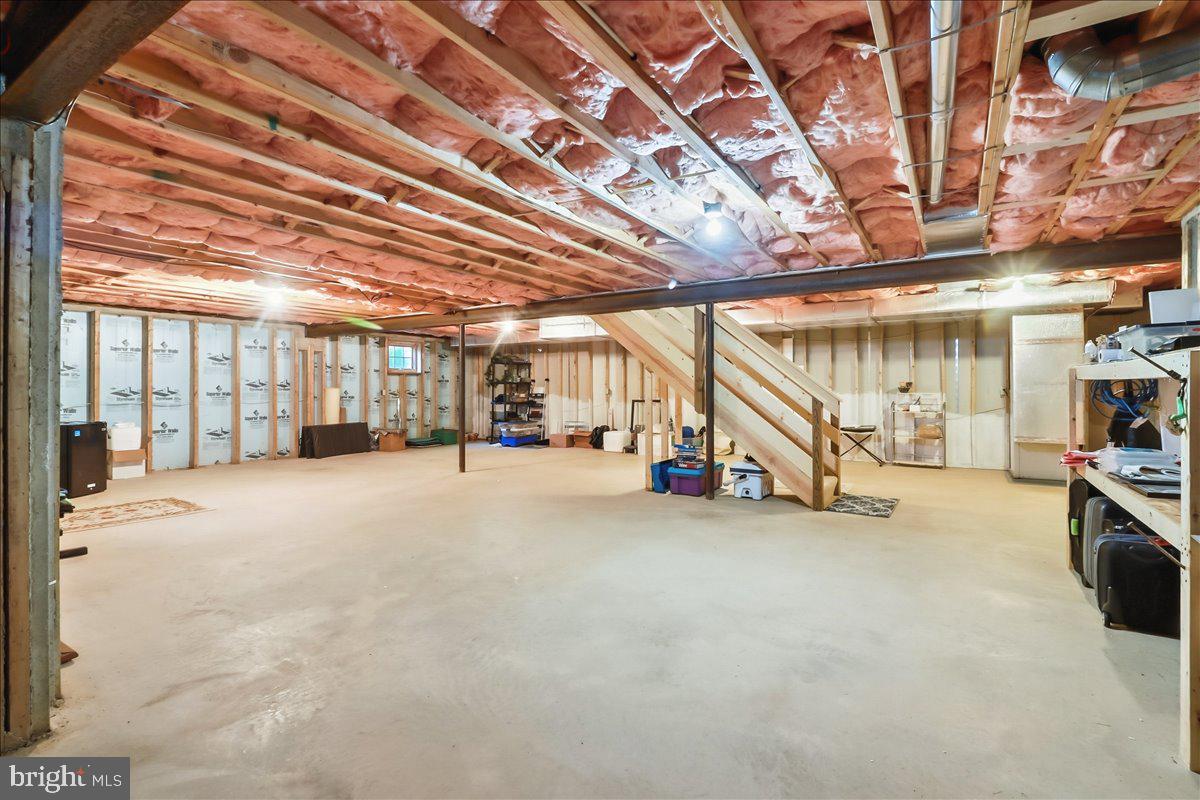 9 Parkside Drive Elverson, PA 19520 - Photo 23 of 33 a view of an empty room with wooden walls