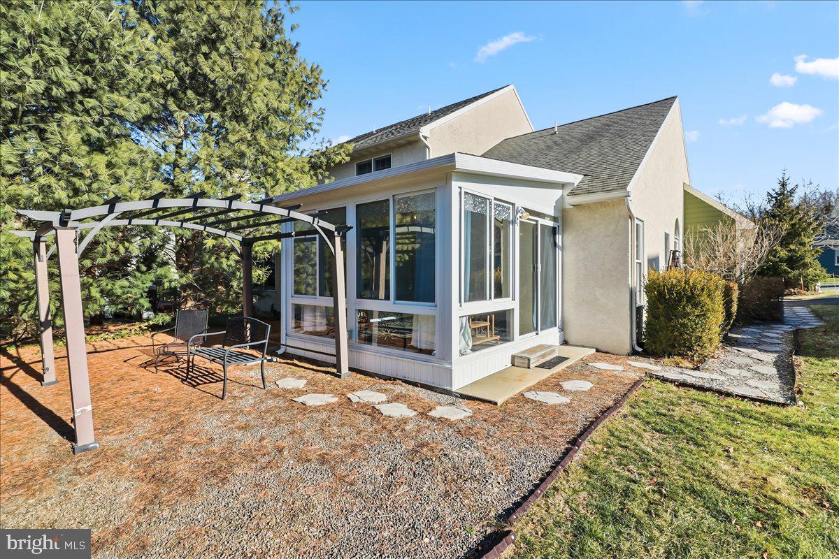 9 Parkside Drive Elverson, PA 19520 - Photo 25 of 33 a view of a house with backyard porch and sitting area