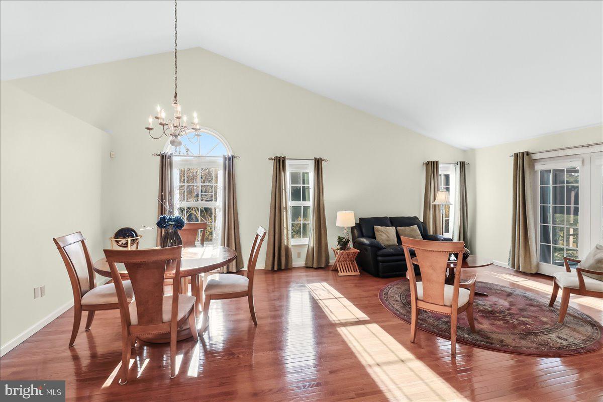 9 Parkside Drive Elverson, PA 19520 - Photo 8 of 33 a view of a dining room with furniture window and wooden floor