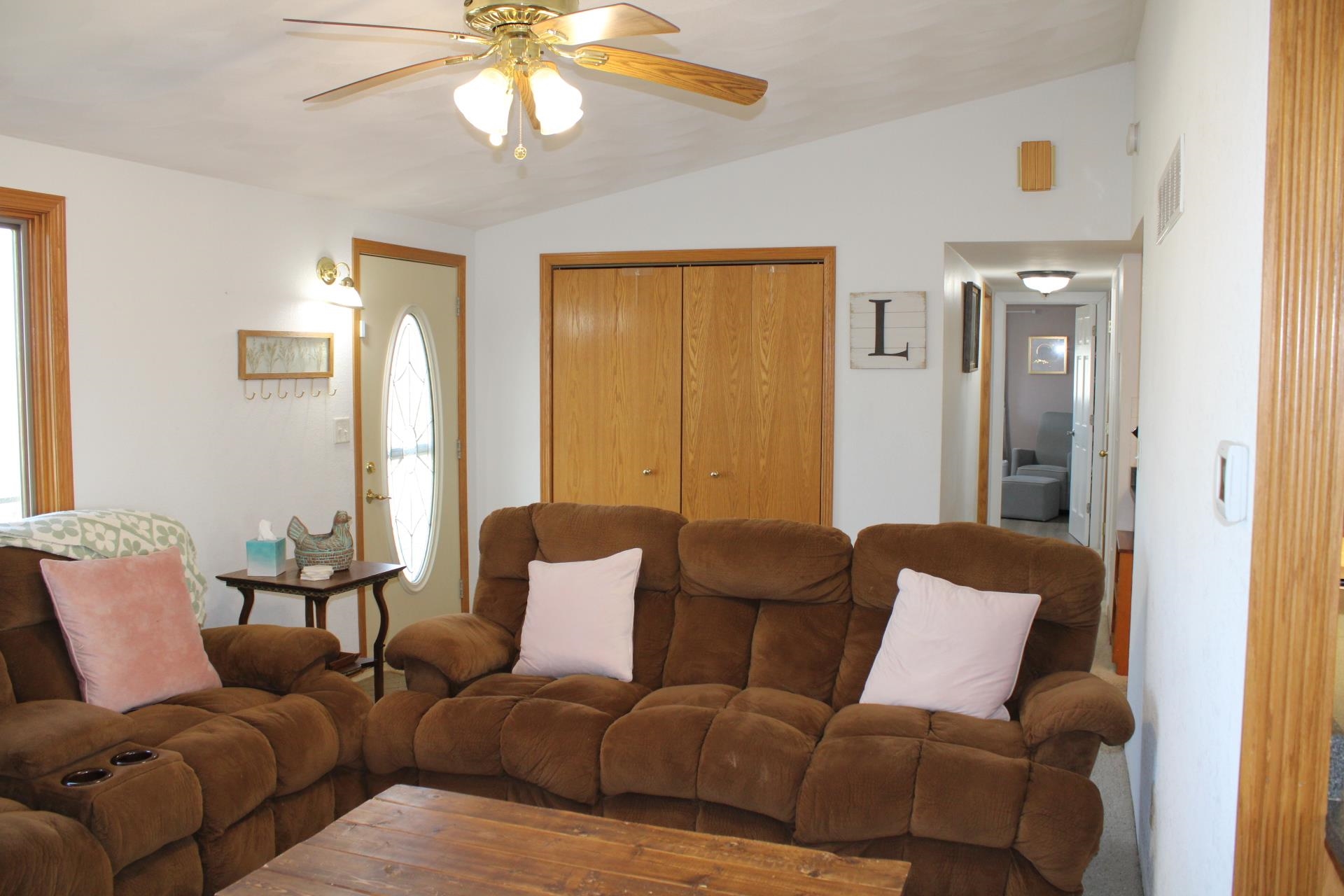 14251 West Kent Road Kent, IL 61044 - Photo 21 of 35 a living room with furniture and a chandelier