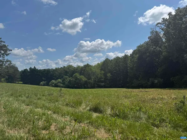 a view of a golf course with a lake