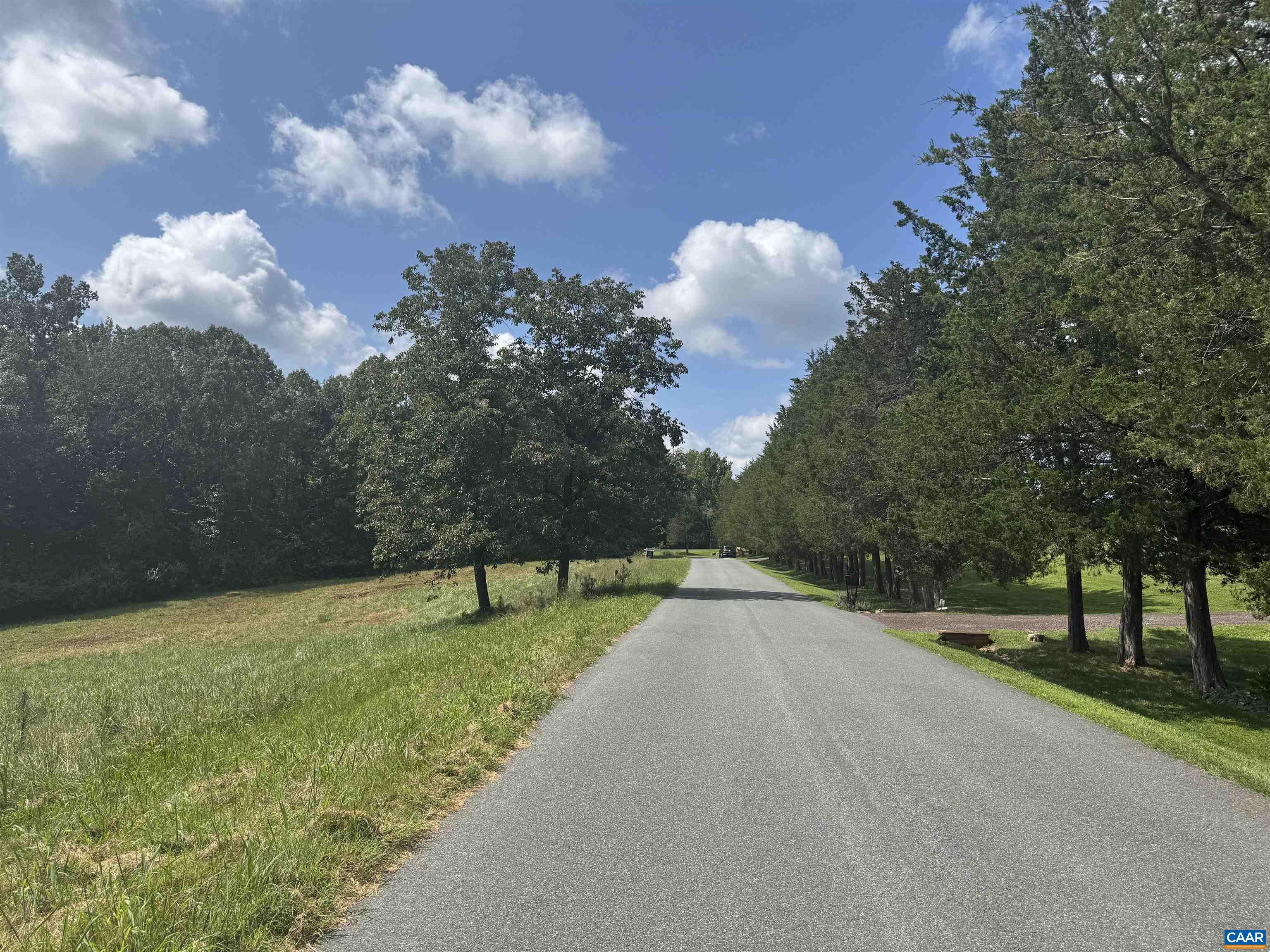 1 Frays Ridge Road Earlysville, VA 22936 - Photo 7 of 11 a view of a golf course with a lake