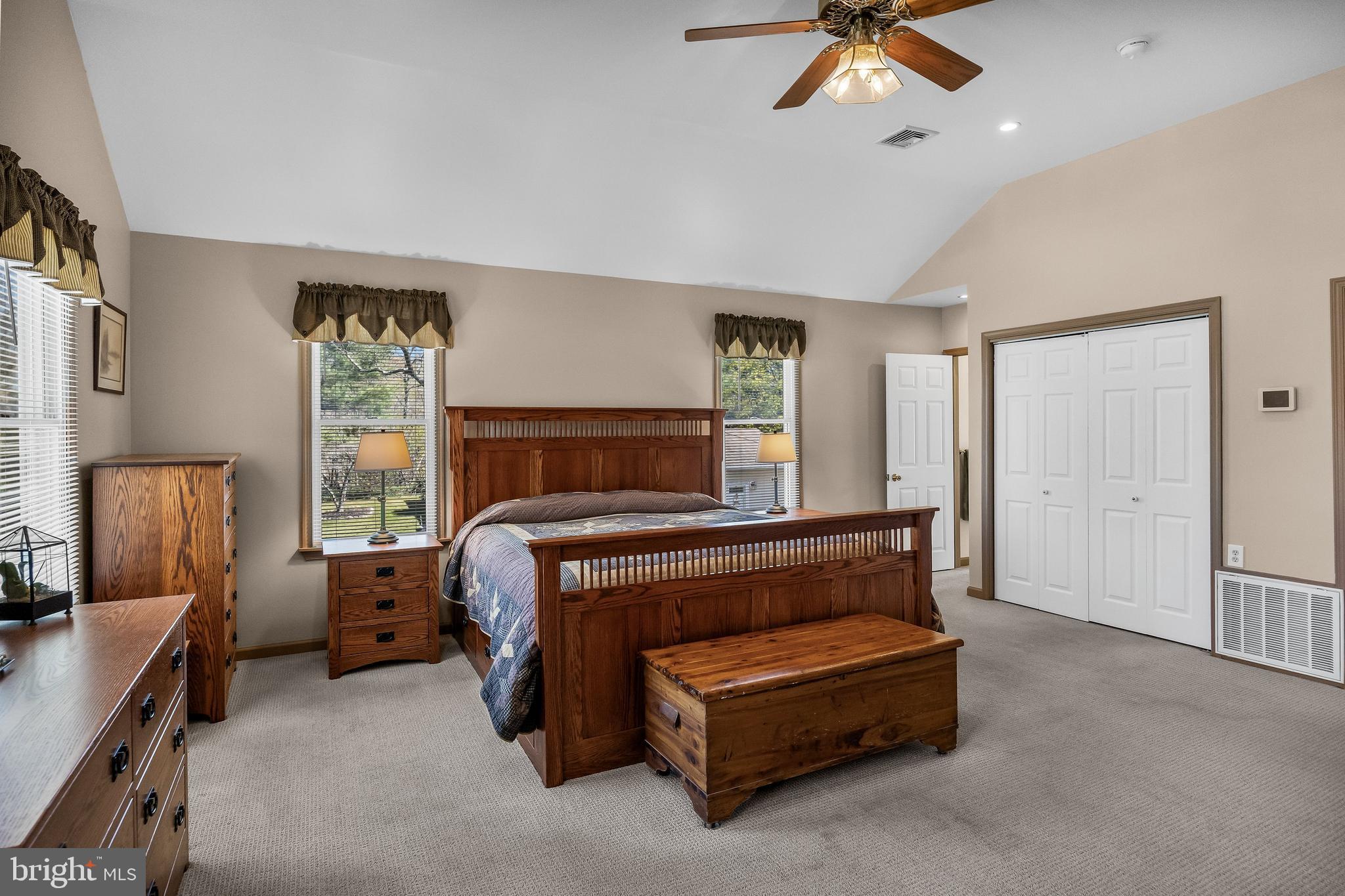 446 Prospect Avenue West Berlin, NJ 08091 - Photo 22 of 54 a bedroom with a bed and a chandelier