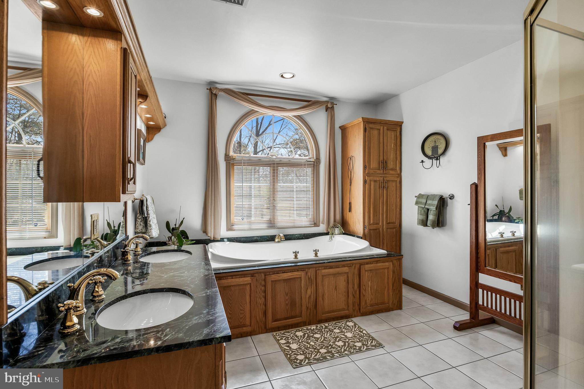 446 Prospect Avenue West Berlin, NJ 08091 - Photo 24 of 54 a bathroom with a sink a mirror and a window