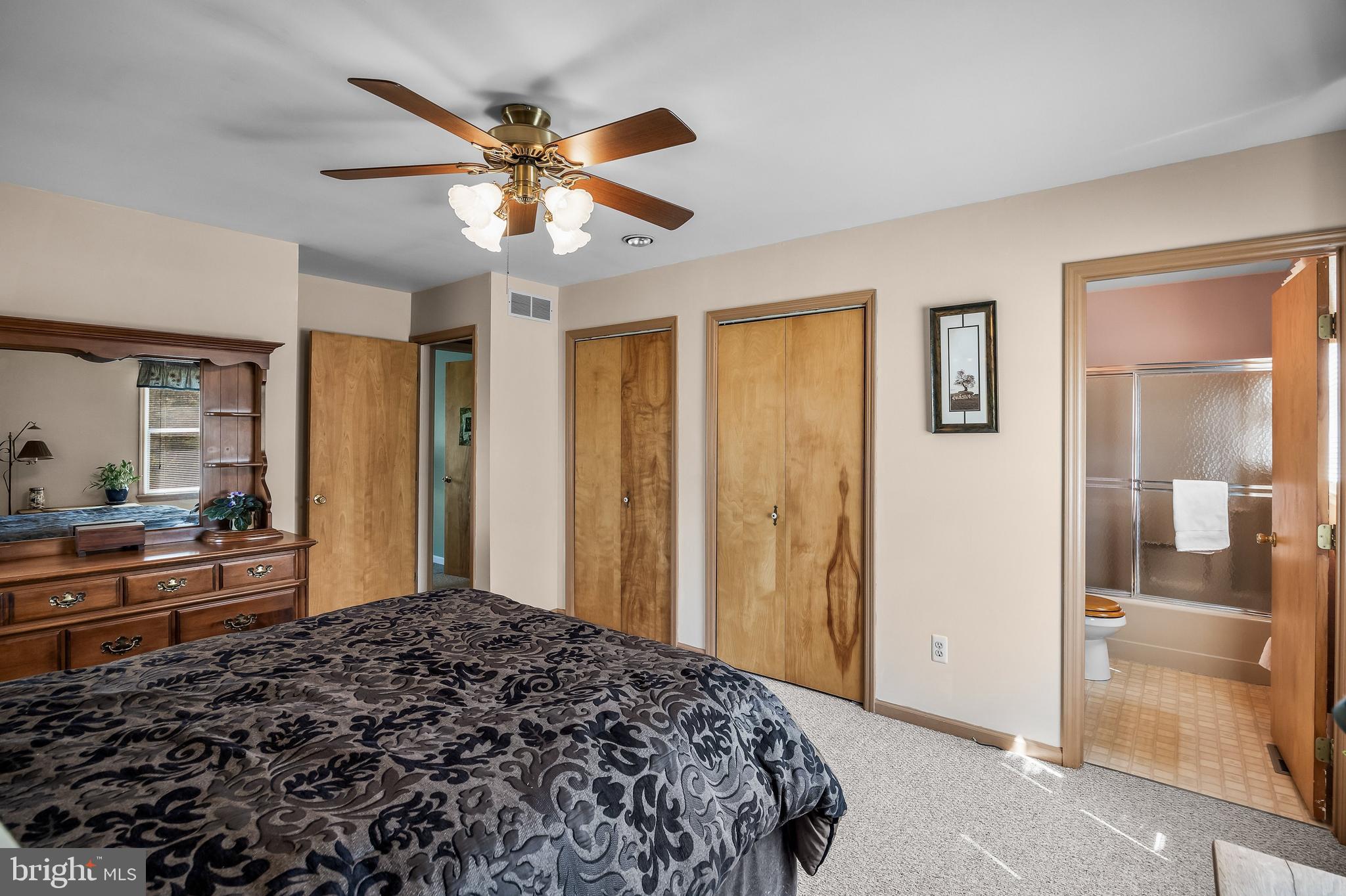 446 Prospect Avenue West Berlin, NJ 08091 - Photo 33 of 54 a bedroom with a bed and a chandelier