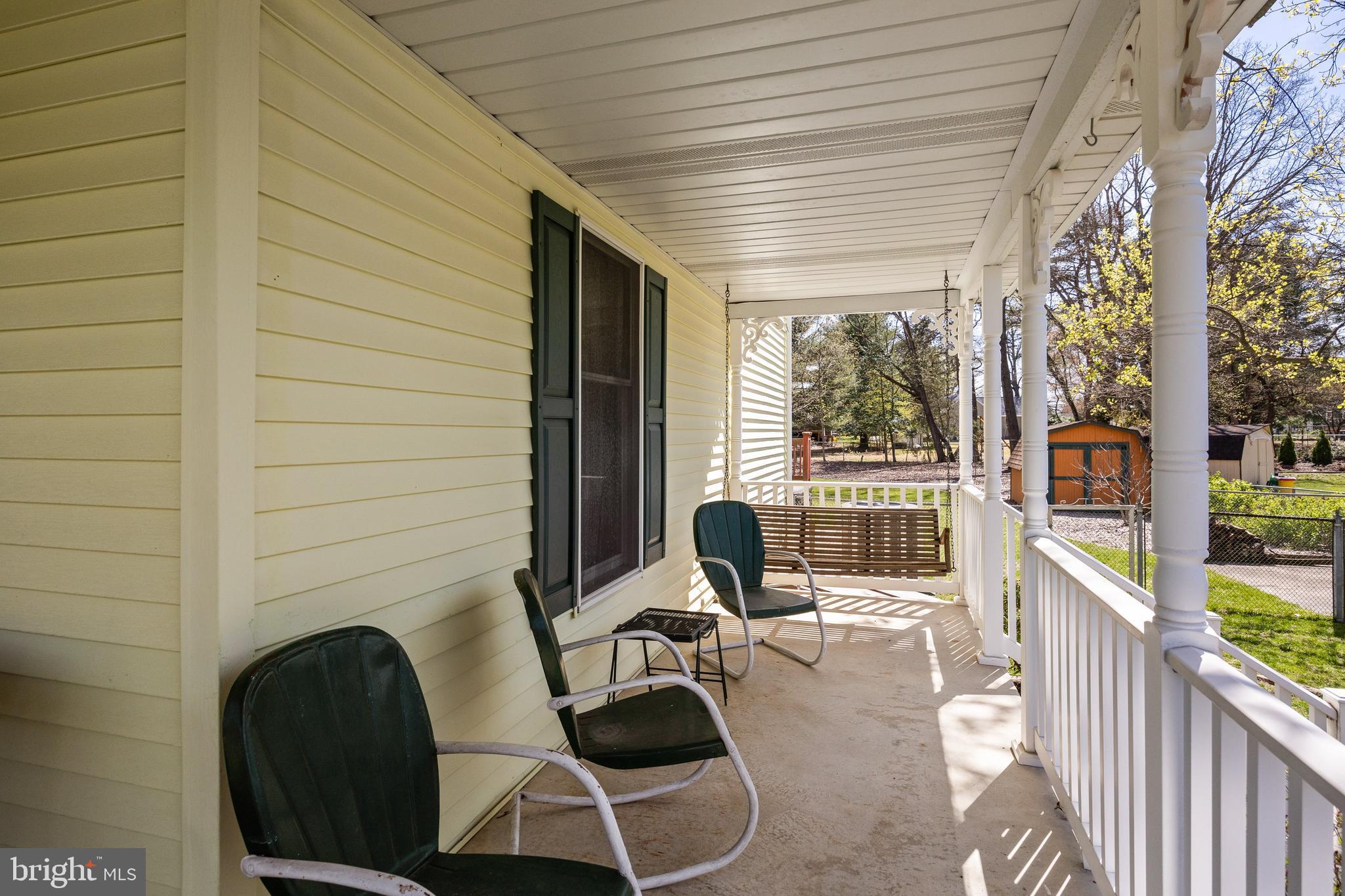 446 Prospect Avenue West Berlin, NJ 08091 - Photo 5 of 54 a view of a balcony with chairs