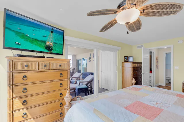 a bathroom with a granite countertop sink and shower