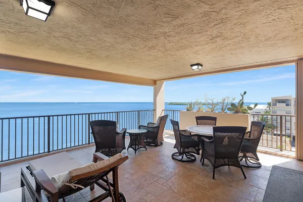 a view of building with potted plants