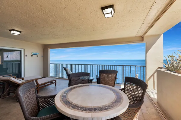 a view of a livingroom with furniture and window