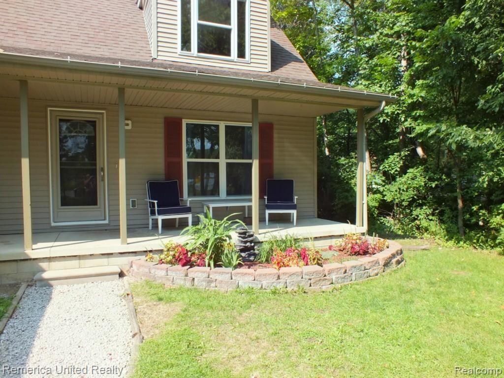 38558 Judd Road Belleville, MI 48111 - Photo 2 of 28 Covered Porch.jpg