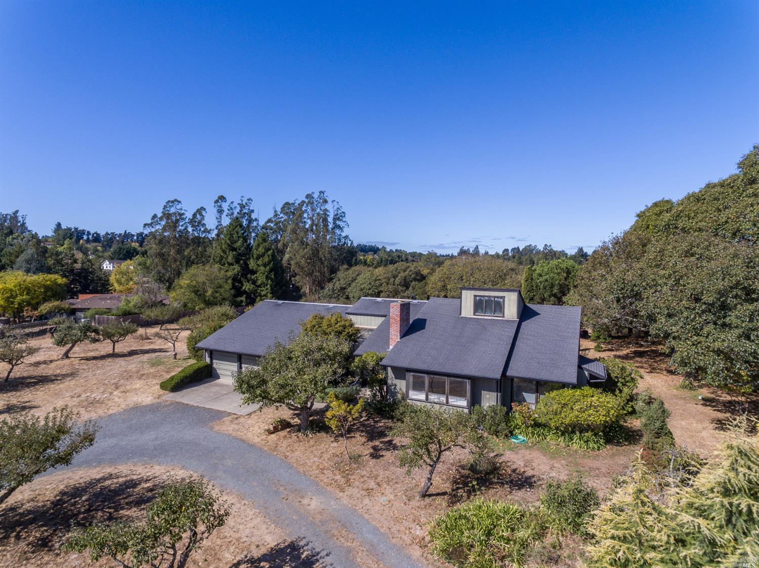 2263 Schaeffer Road Sebastopol, CA 95472 - Photo 1 of 1 a view of a garden with houses