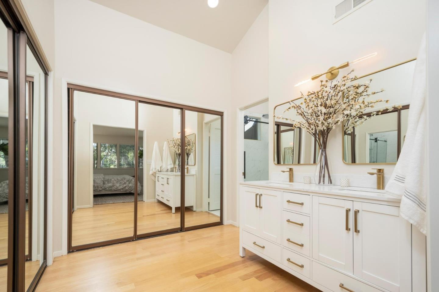 2499 Alpine Road Menlo Park, CA 94025 - Photo 16 of 28 a spacious bathroom with a double vanity sink and mirror