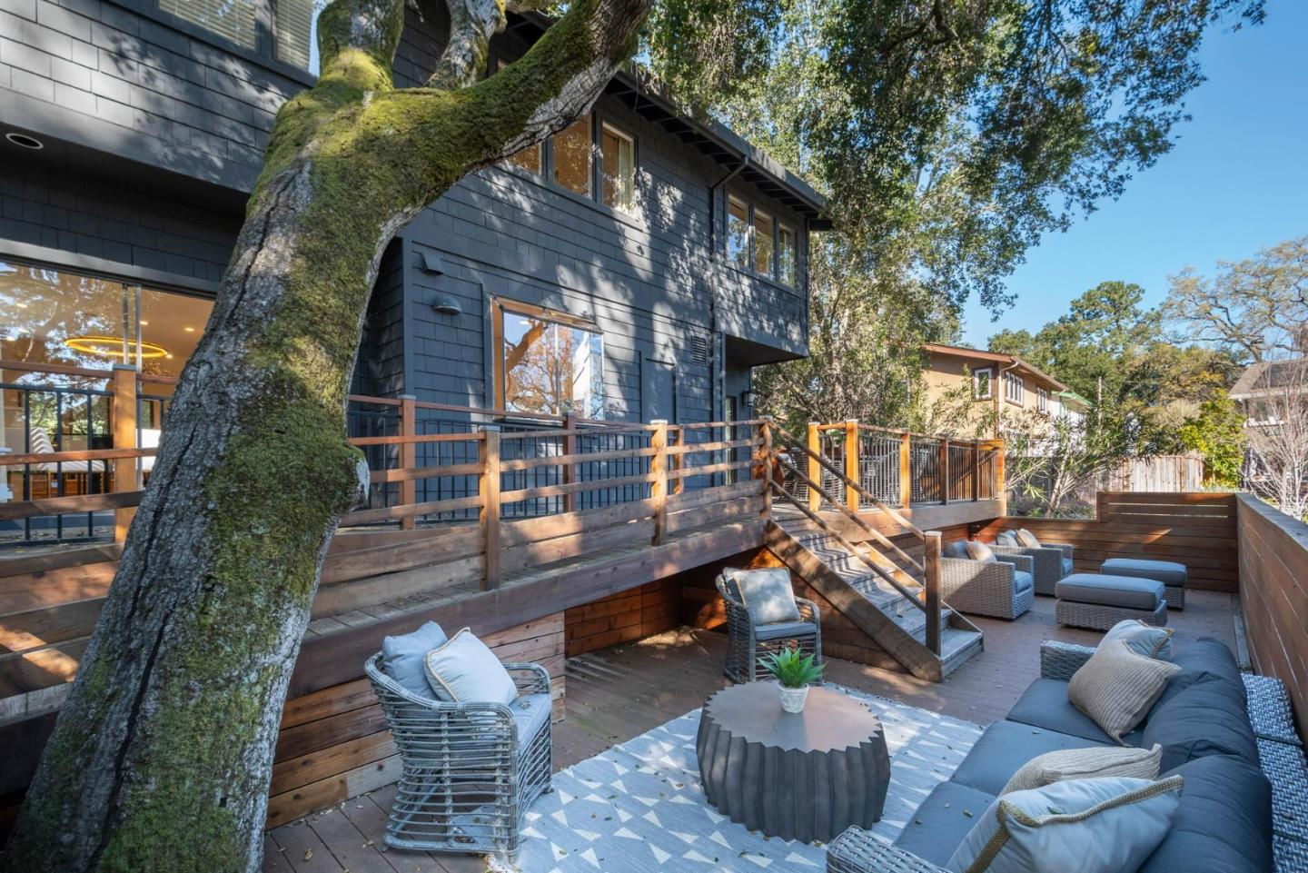 2499 Alpine Road Menlo Park, CA 94025 - Photo 25 of 28 a view of a chairs and table in the back yard of the house
