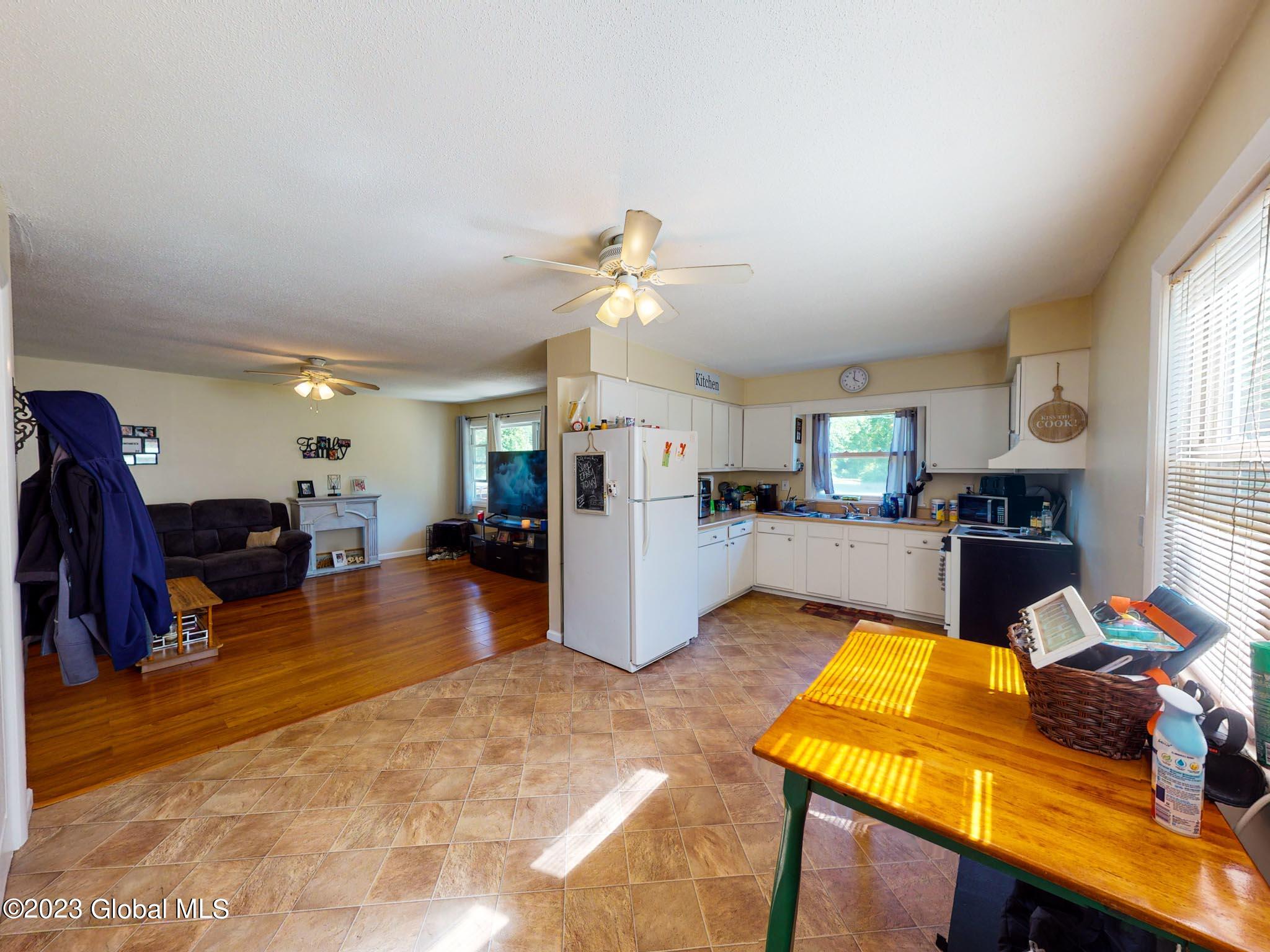 99-101 Vosburgh Road Halfmoon, NY 12118 - Photo 8 of 18 KITCHEN _ LIVING ROOM1