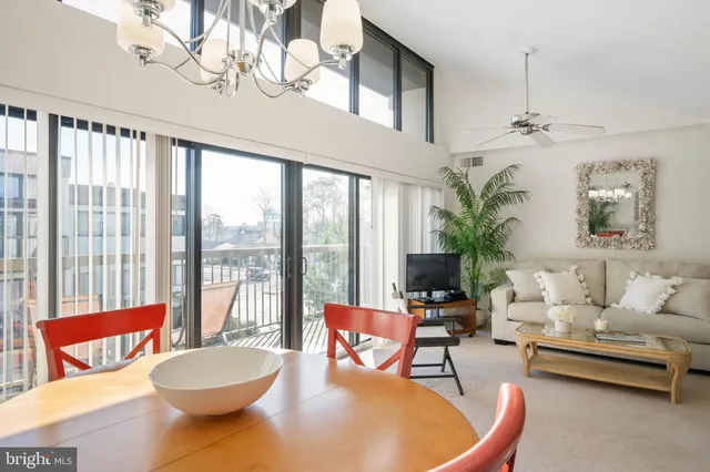 a kitchen with stainless steel appliances a stove a microwave and a cabinets