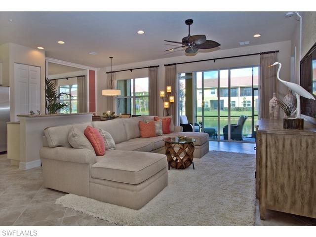 6545 Monterey Point Naples, FL 34105 - Photo 2 of 10 a living room with furniture and a large window