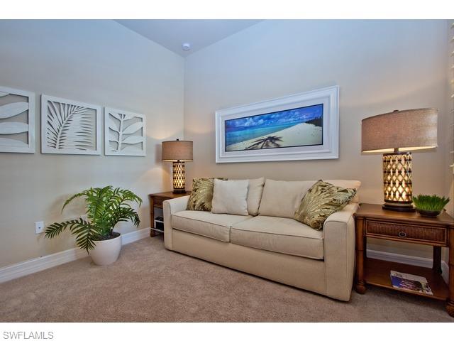 6545 Monterey Point Naples, FL 34105 - Photo 3 of 10 a living room with furniture and a potted plant