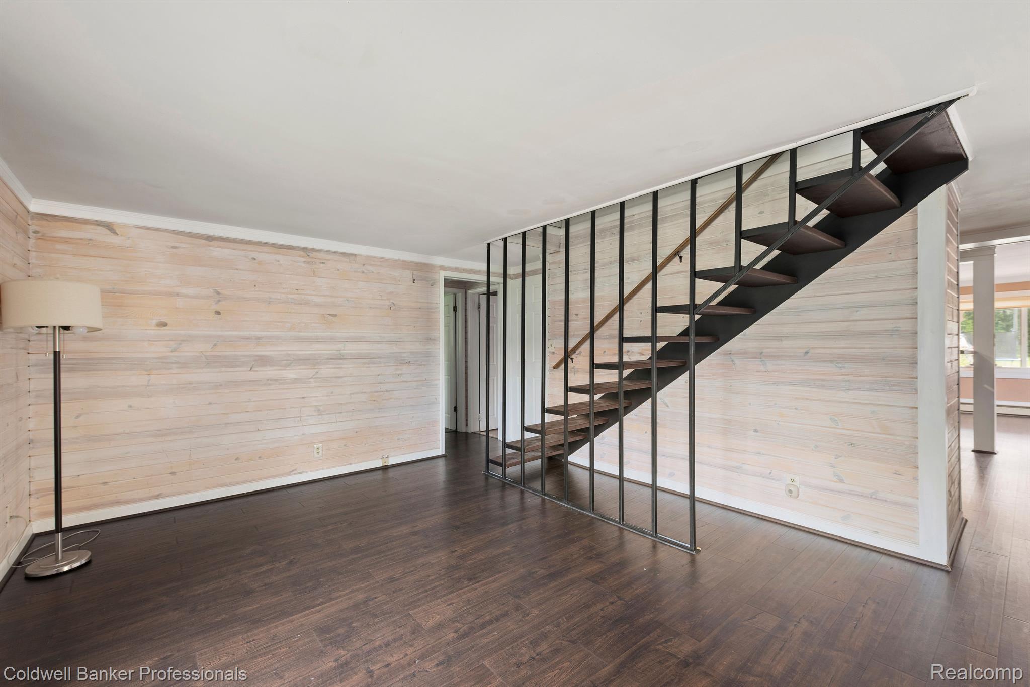 72200 Lassier Road Romeo, MI 48065 - Photo 17 of 28 Open staircase leading to upstairs bedroom