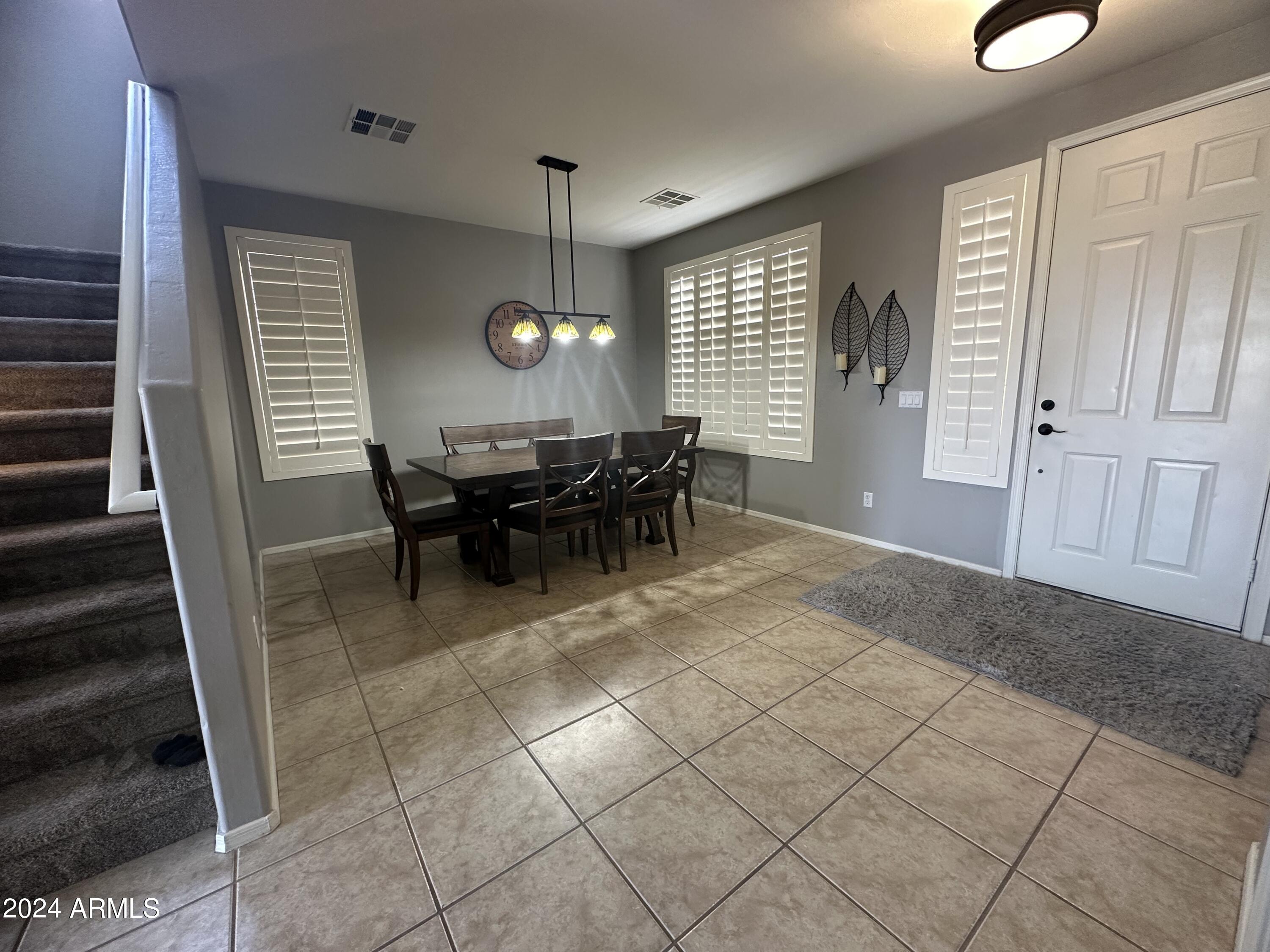 90 West Beechnut Place Chandler, AZ 85248 - Photo 16 of 31 a view of a livingroom with furniture and window