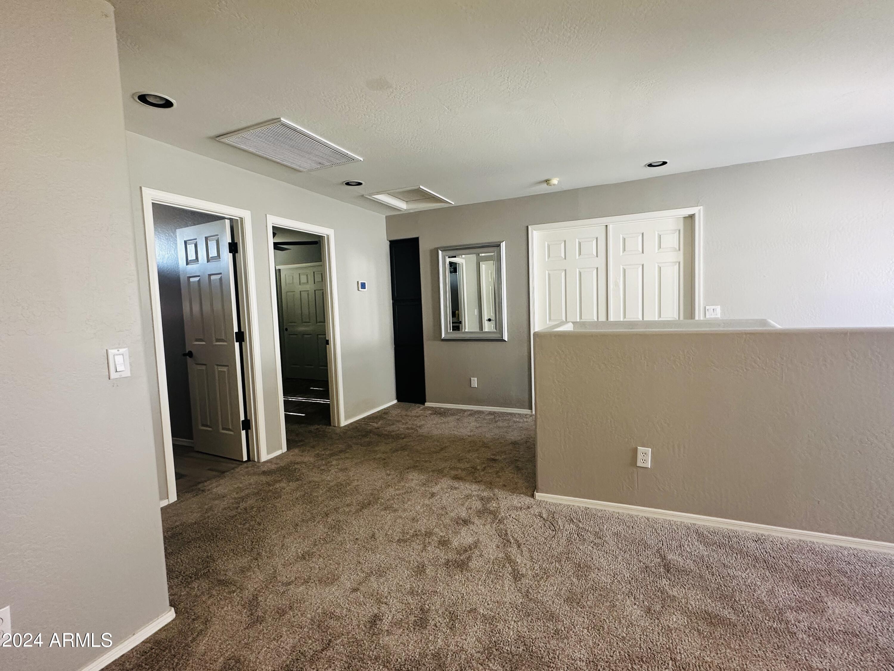 90 West Beechnut Place Chandler, AZ 85248 - Photo 20 of 31 an empty room with windows and closet