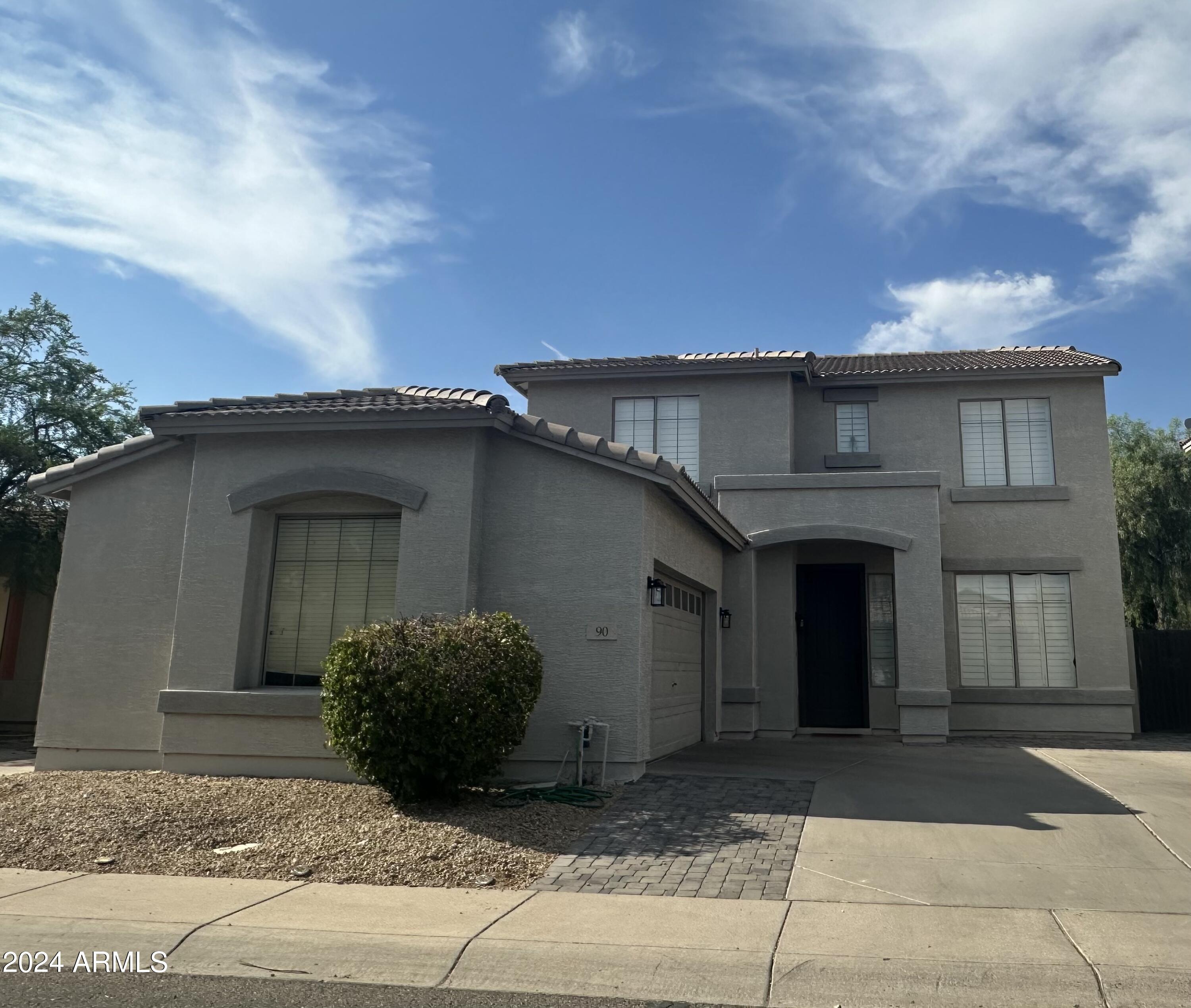 90 West Beechnut Place Chandler, AZ 85248 - Photo 2 of 31 a view of a house with a garage