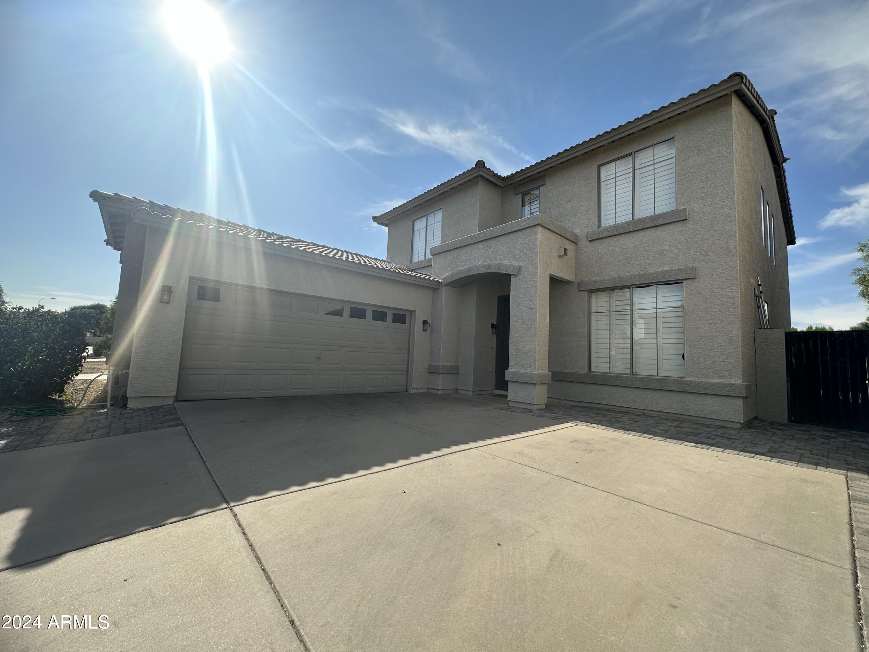90 West Beechnut Place Chandler, AZ 85248 - Photo 31 of 31 a front view of a house with a garage