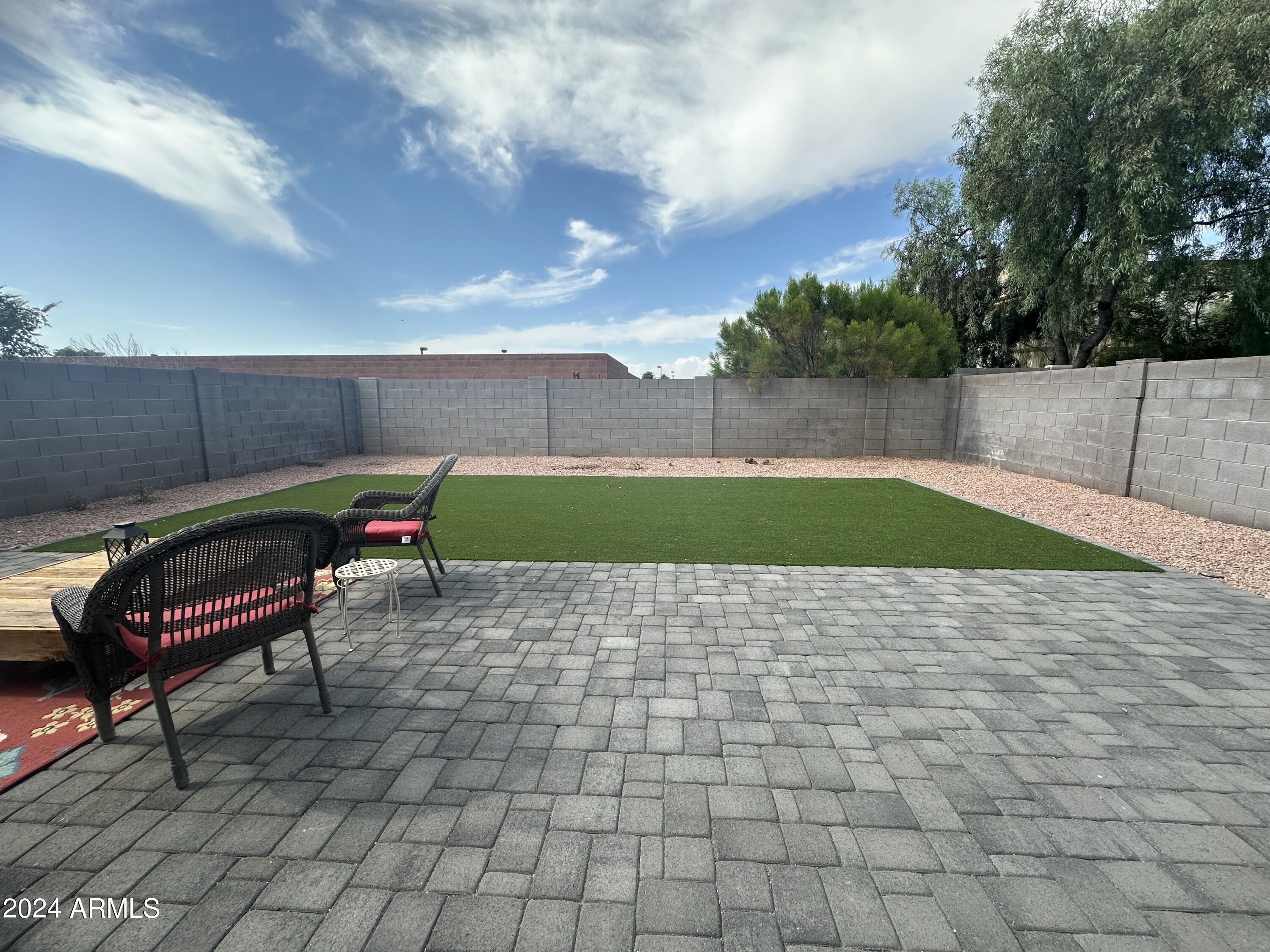 90 West Beechnut Place Chandler, AZ 85248 - Photo 5 of 31 a garden view with a seating space