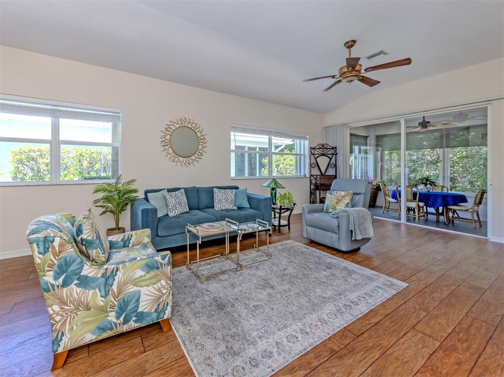 205 Reclinata Circle Venice, FL 34292 - Photo 10 of 62 a living room with furniture and a large window