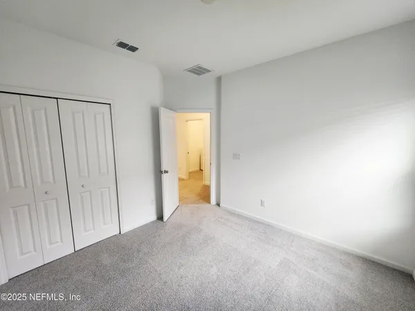 a view of park and fence