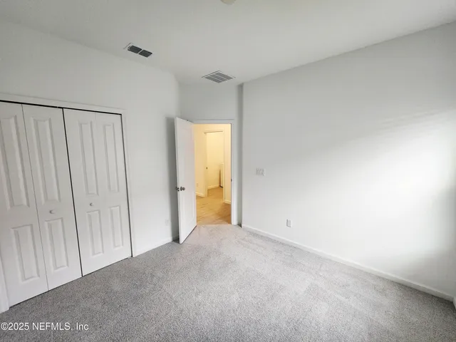 a view of park and fence