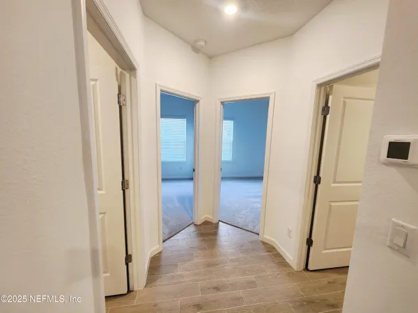 a bathroom with a sink a mirror and a bathtub