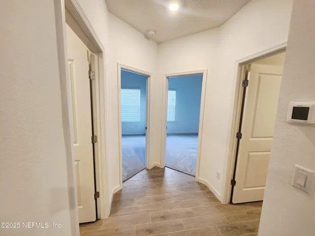 a bathroom with a sink a mirror and a bathtub