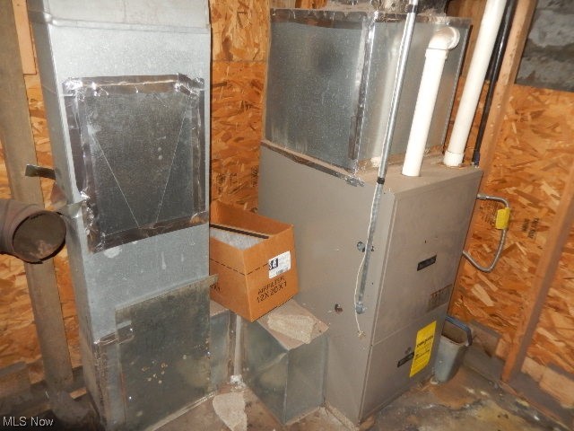 1302 Duncan Street Southwest Massillon, OH 44647 - Photo 20 of 22 Utility room with heating utilities