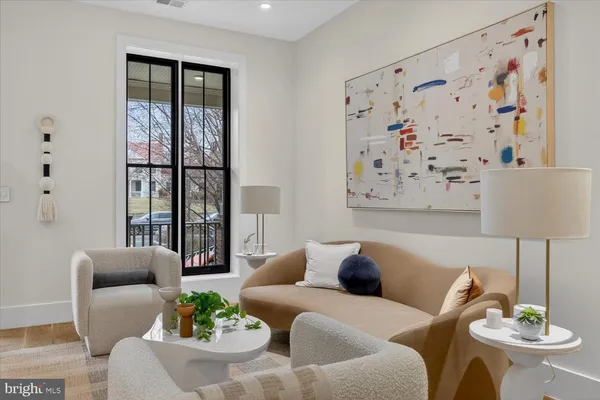a living room with furniture and a couch