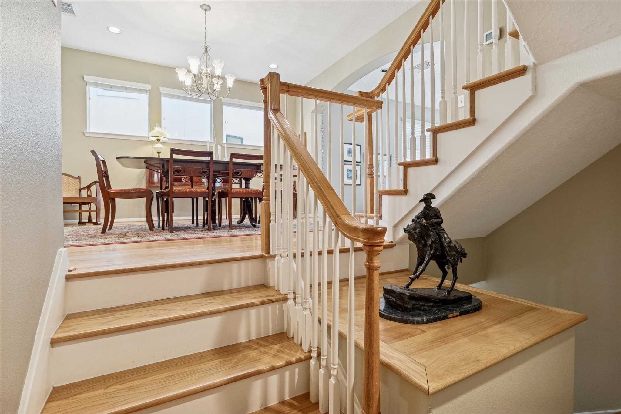 210 Malone Street Houston, TX 77007 - Photo 10 of 34 The stairs and main floor (2nd floor) of the home have natural hardwoods.