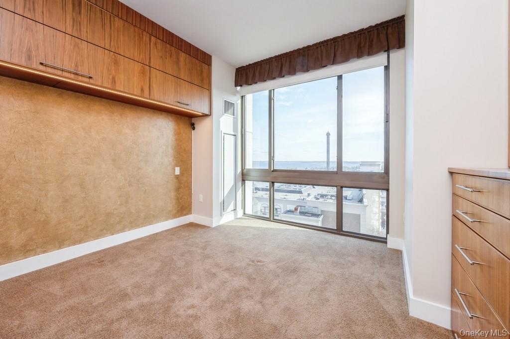 175 Huguenot Street, Unit 1604 New Rochelle, NY 10801 - Photo 8 of 24 Large master bedroom with spa bath and walk in closet.