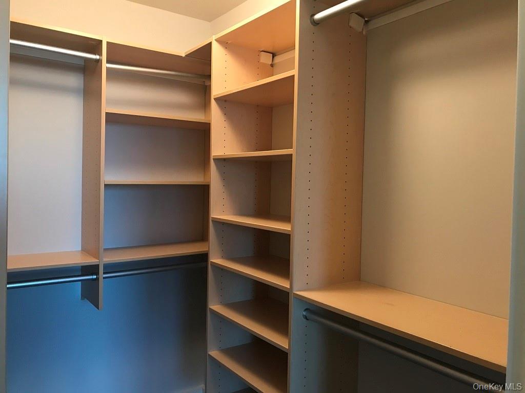 175 Huguenot Street, Unit 1604 New Rochelle, NY 10801 - Photo 9 of 24 Master bedroom custom closet.