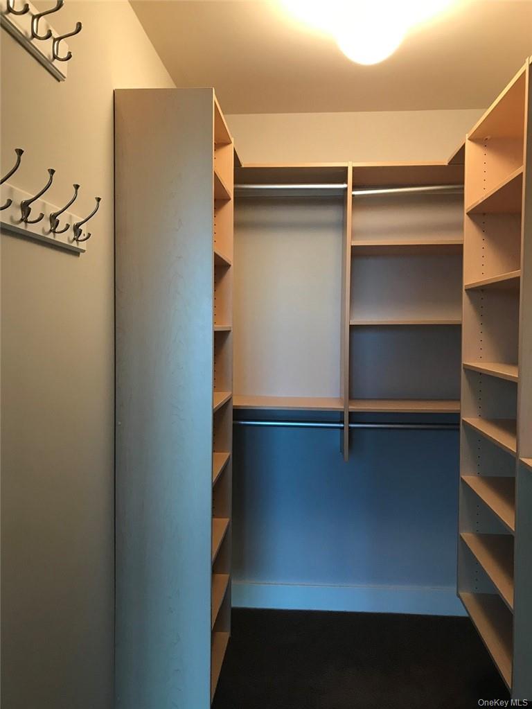 175 Huguenot Street, Unit 1604 New Rochelle, NY 10801 - Photo 10 of 24 Master bedroom custom closet.