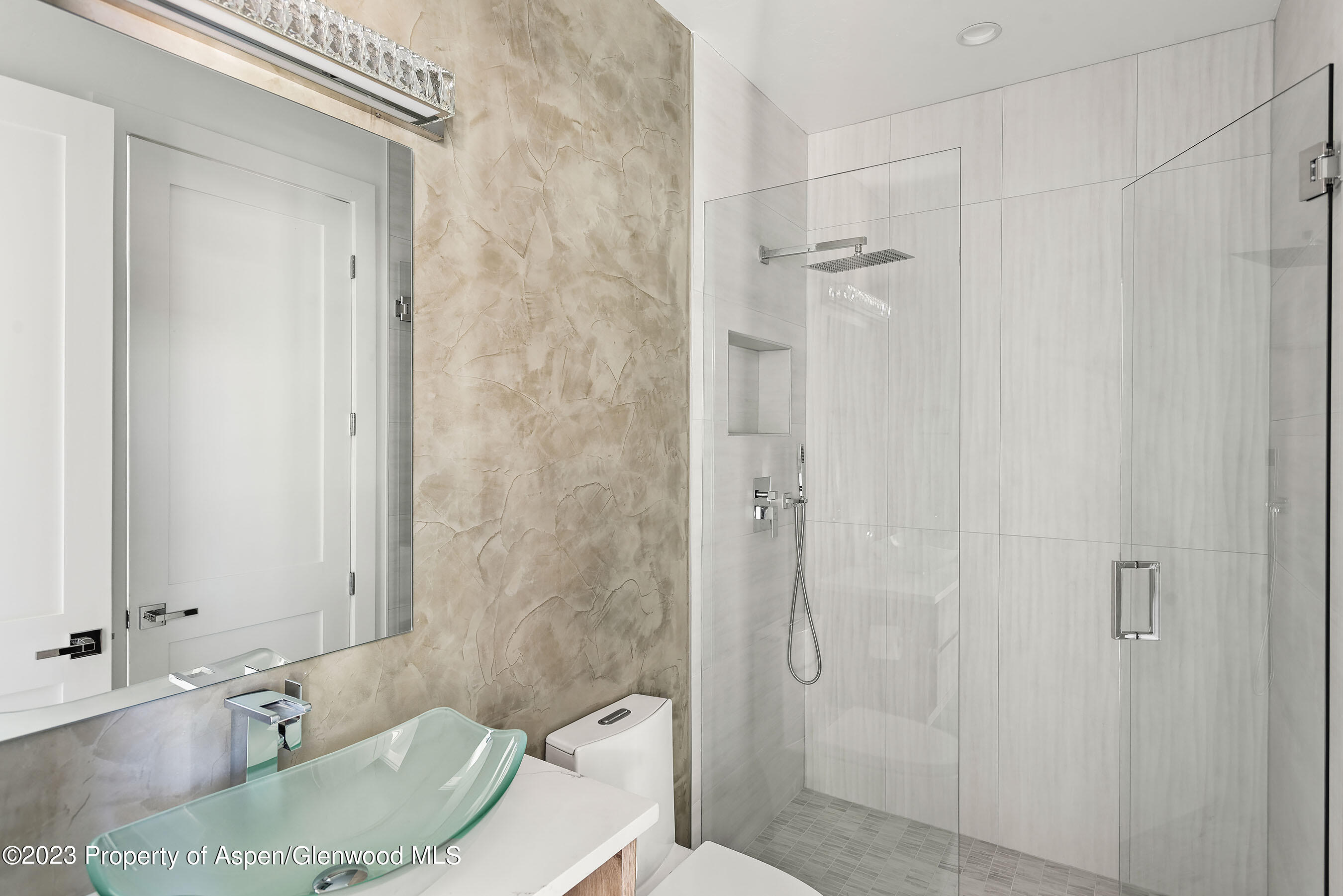 89 Fox Prowl Lane Carbondale, CO 81623 - Photo 11 of 15 a bathroom with a granite countertop sink toilet and shower